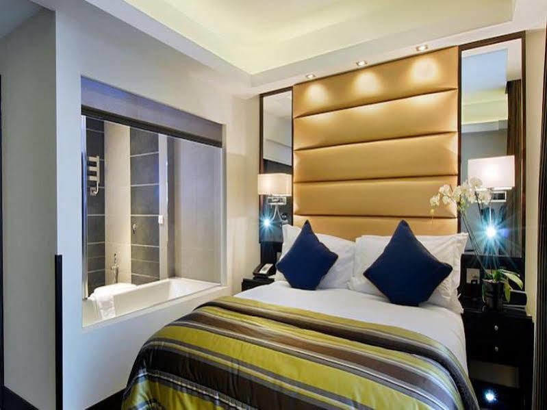 Park Grand Mayfair Londra Exterior foto A bedroom at the hotel